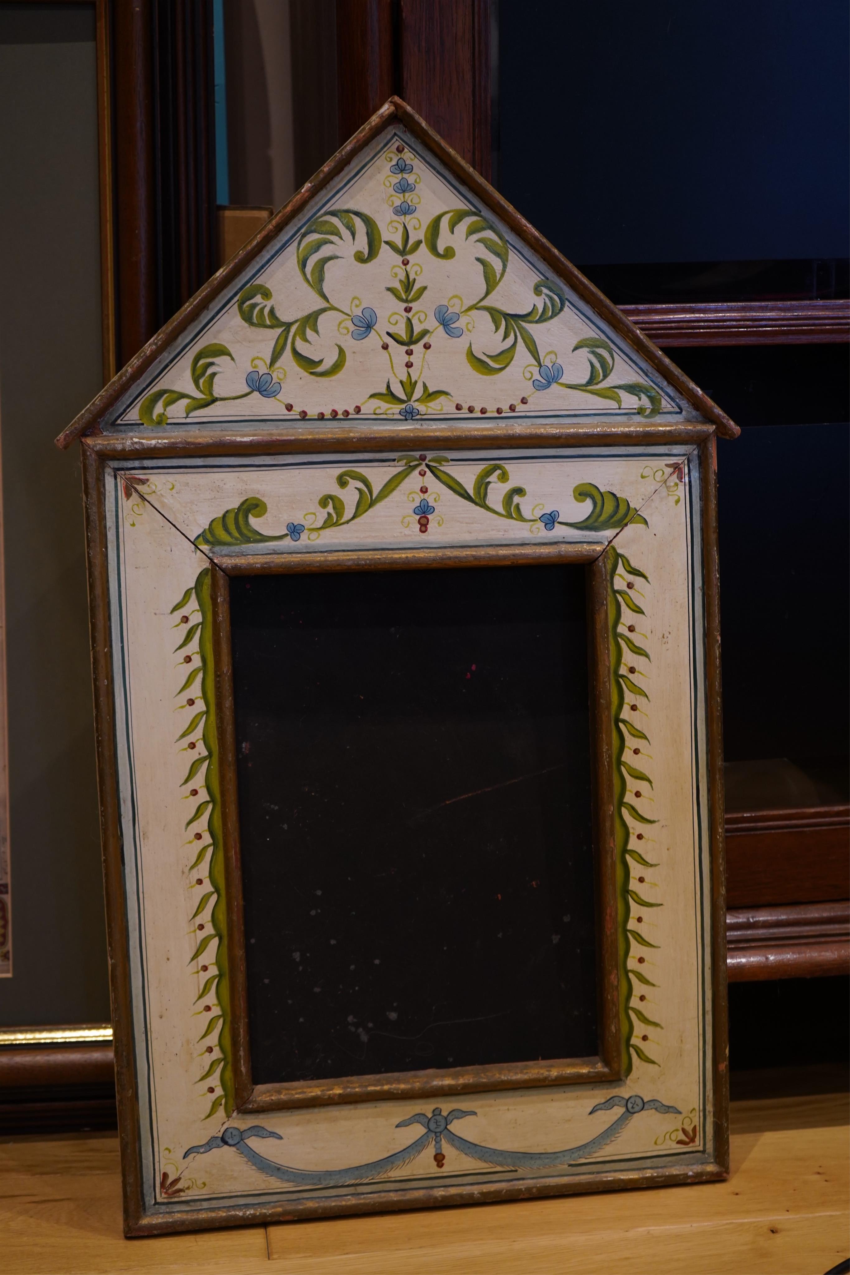 A late 19th century Indian Italianate style floral painted frame and four smaller frames, largest 72cm high. Condition - fair